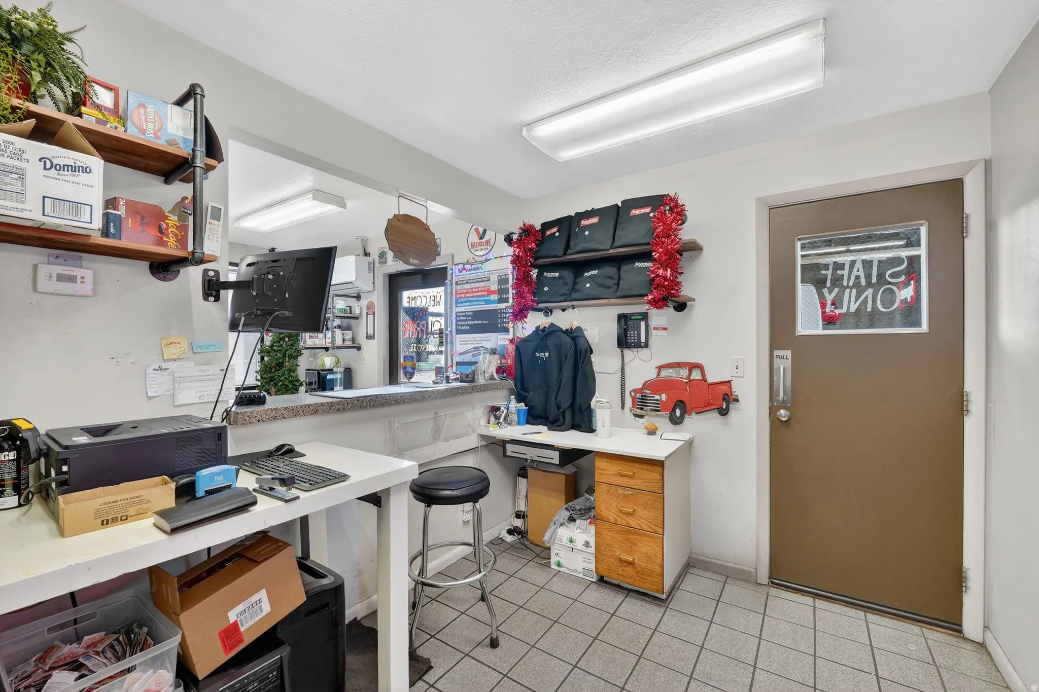 Kitchen with open shelves and light countertops