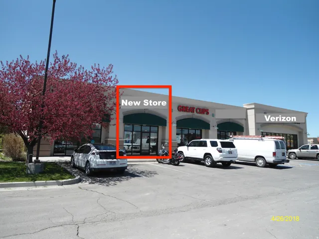 View of commercial location with uncovered parking