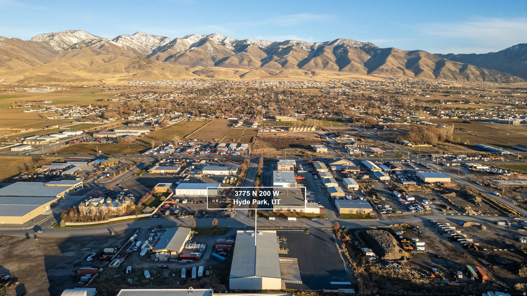 View of property location featuring an industrial area and mountains