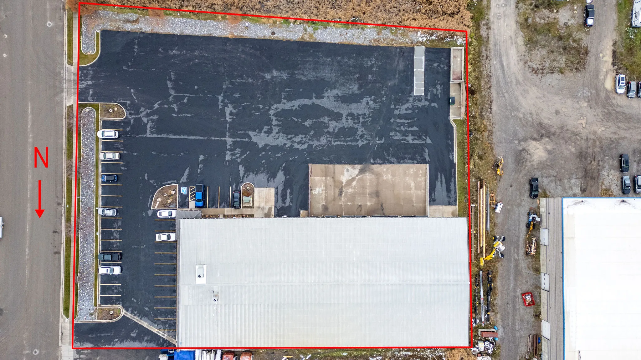 Aerial overview of property's location featuring property parcel outlined