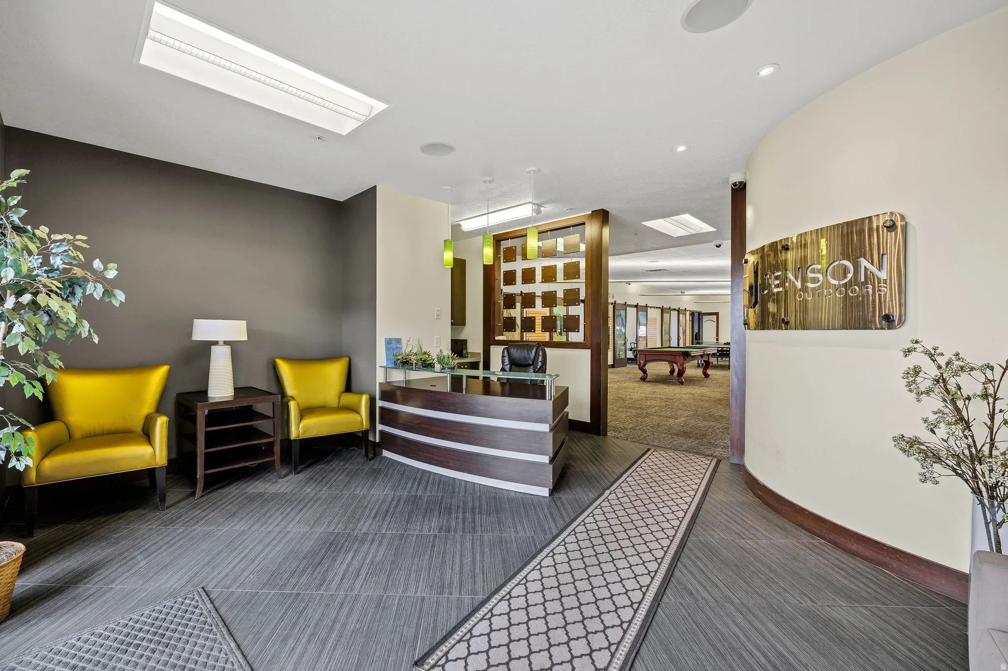 Welcome area featuring billiards table and a skylight