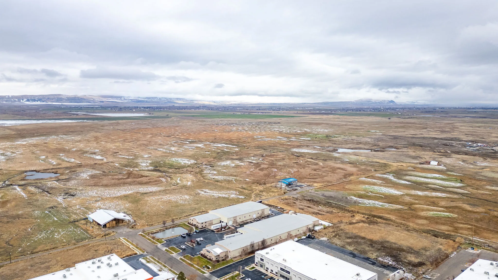 Aerial overview of property's location featuring rural landscape