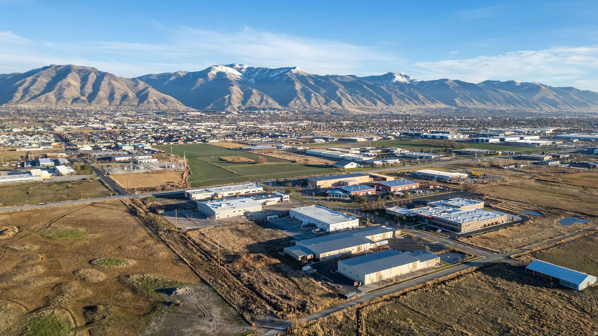 Aerial view of industrial structures and mountains