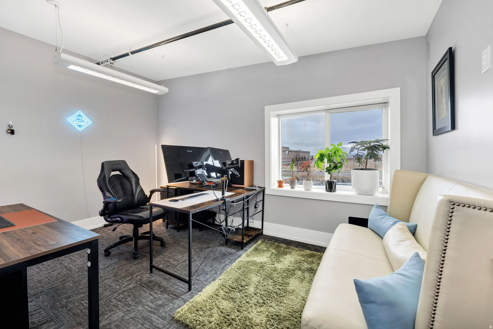 Home office featuring baseboards