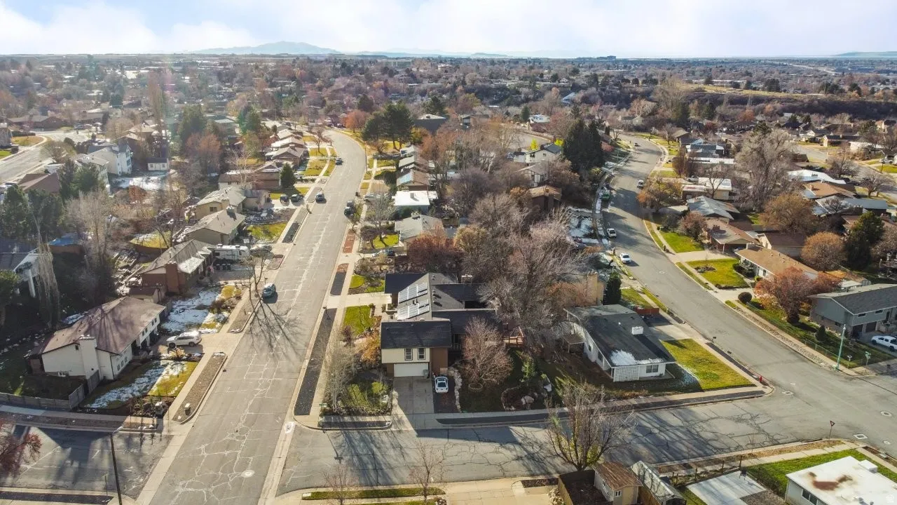 Aerial overview of property's location with nearby suburban area