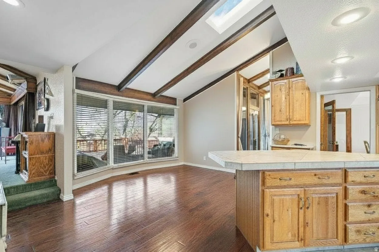 Vaulted ceiling with exposed wood beams