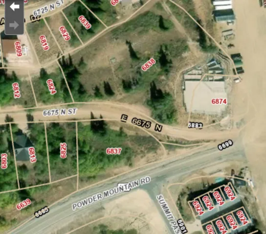 Aerial map of property and surrounding area featuring property parcel outlined