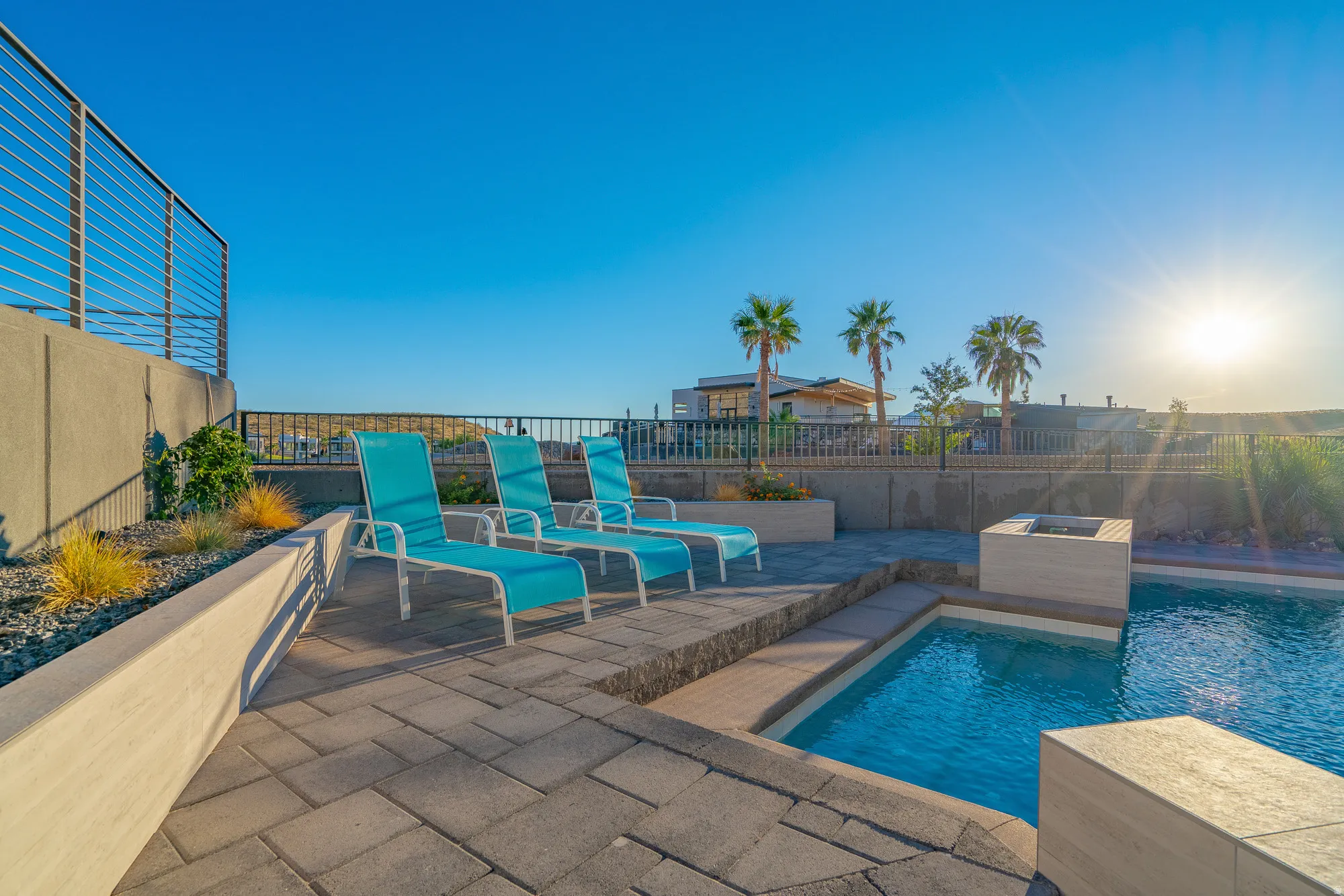 View of pool with a fenced backyard and a patio area