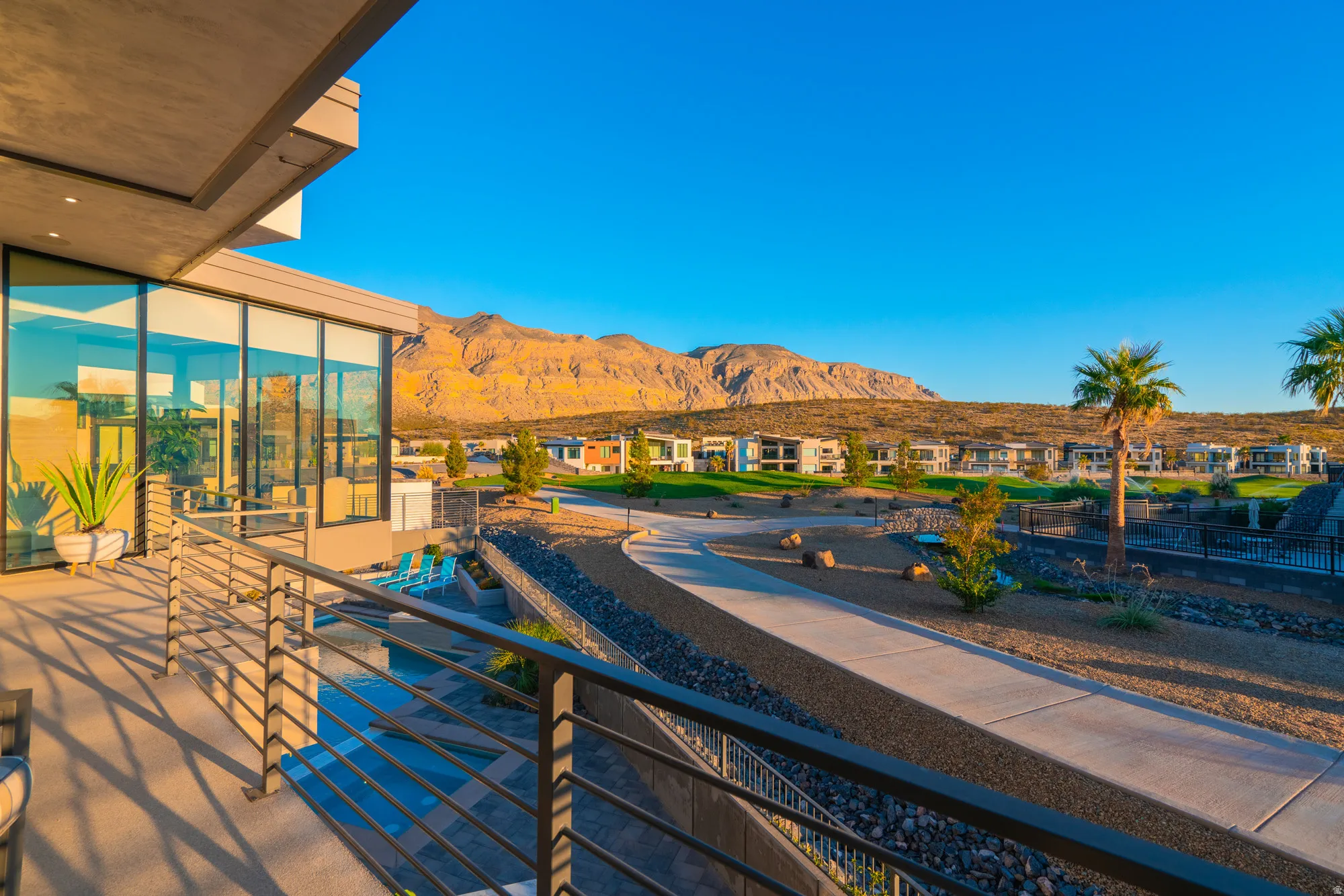 Balcony with a mountain view and a sunroom