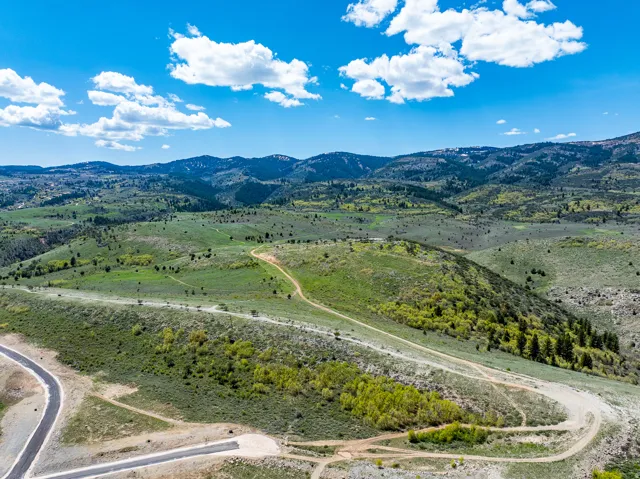 Drone / aerial view of a mountain backdrop