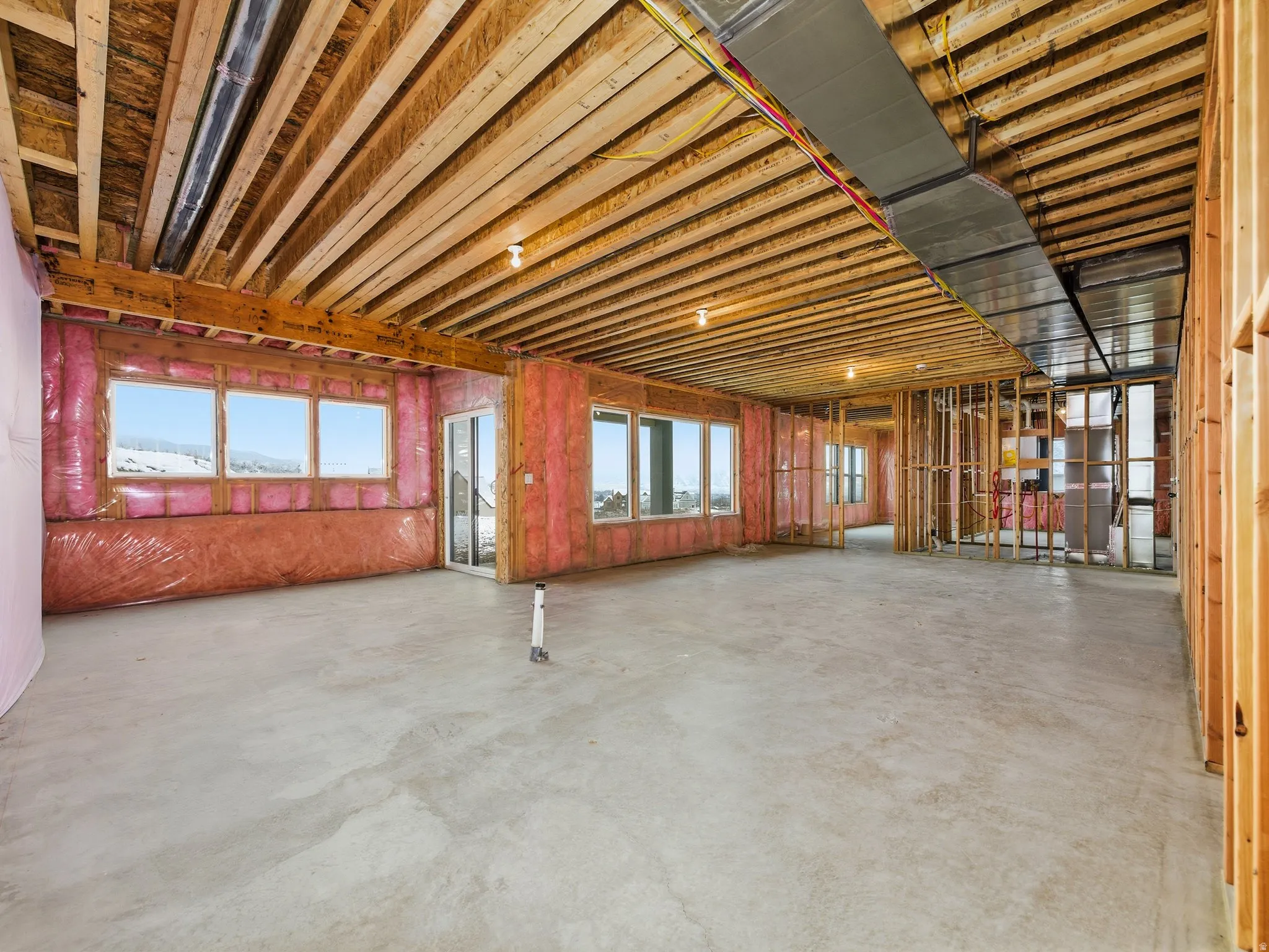 Miscellaneous room featuring concrete floors
