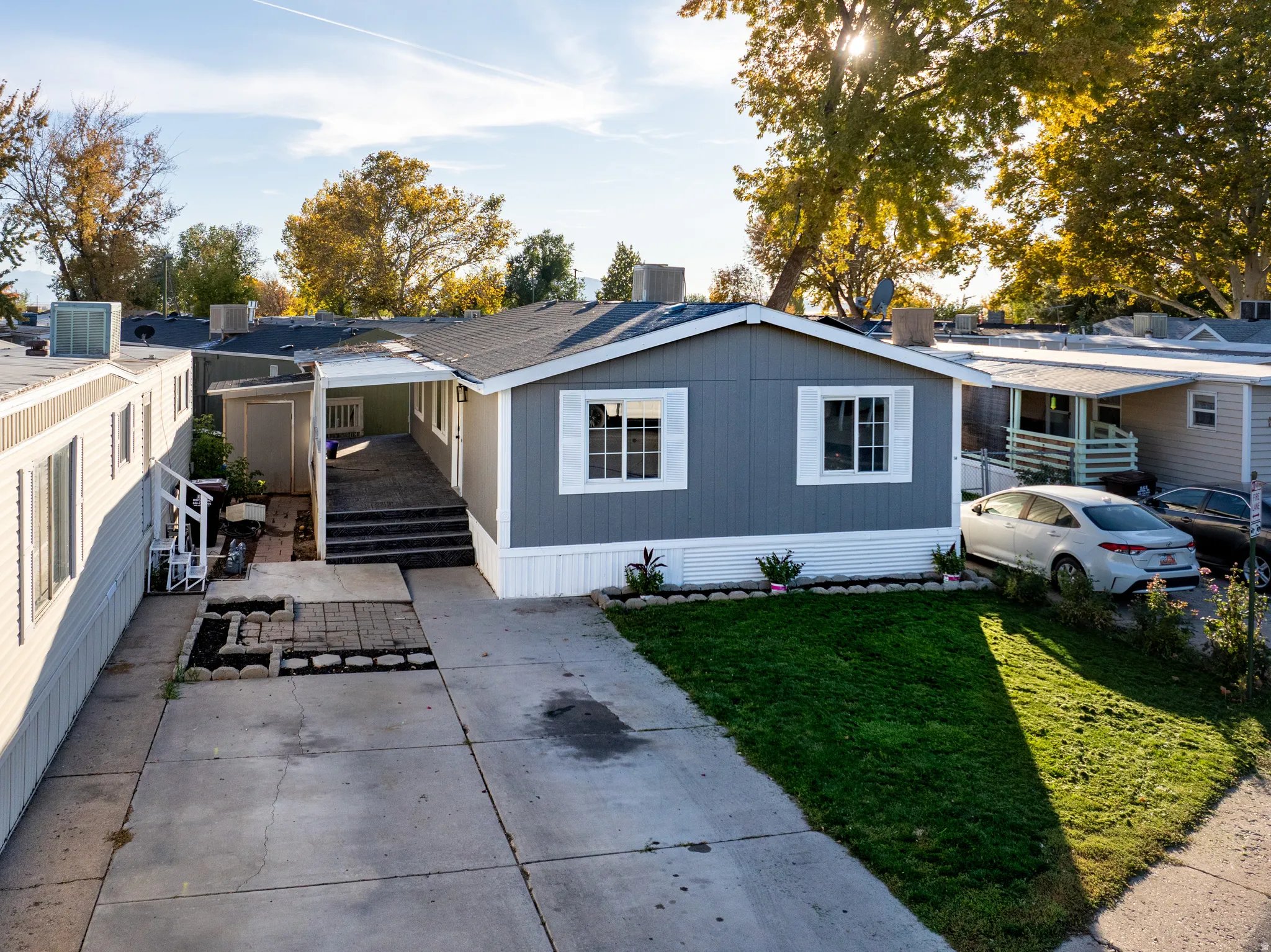 View of front of property with a front lawn and a patio