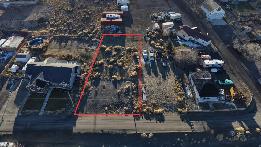 Aerial overview of property's location featuring property parcel outlined