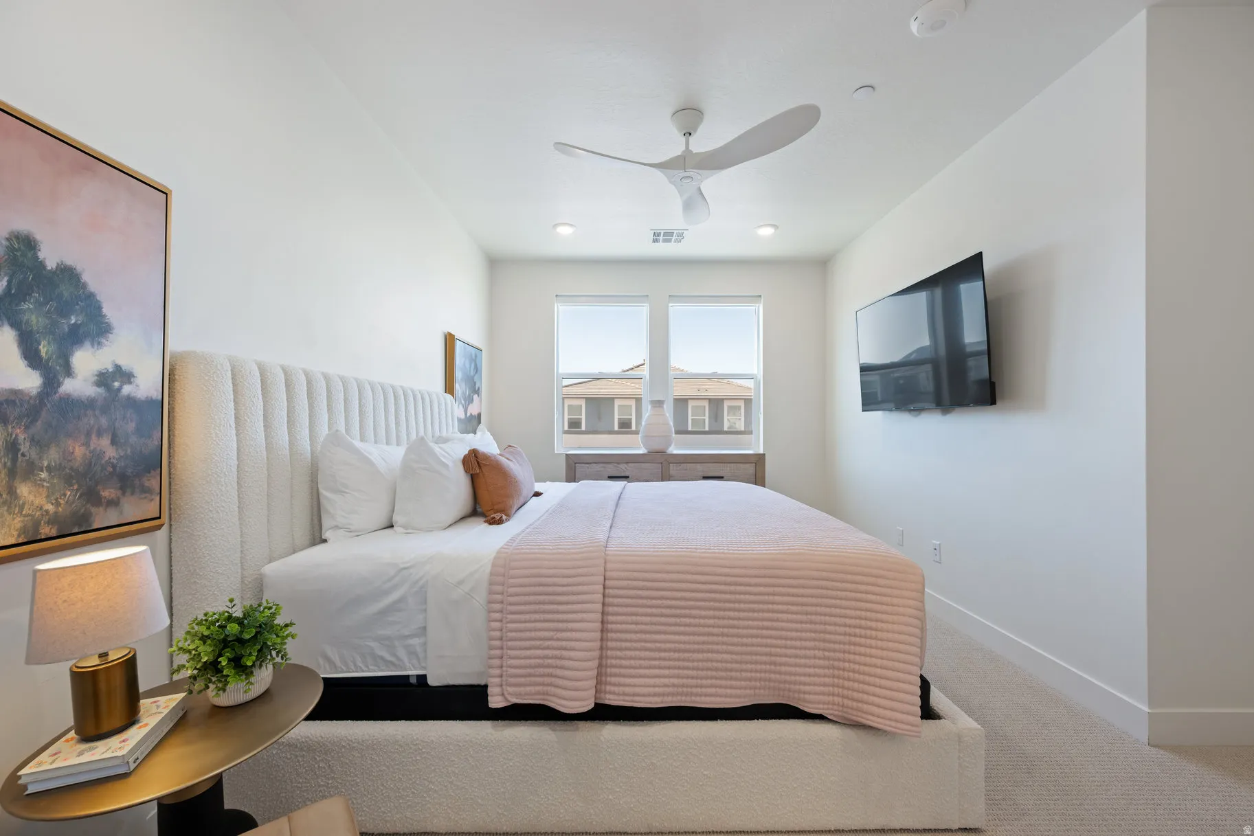 Bedroom featuring carpet flooring and a ceiling fan