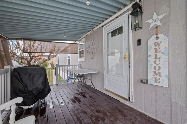 Deck featuring area for grilling