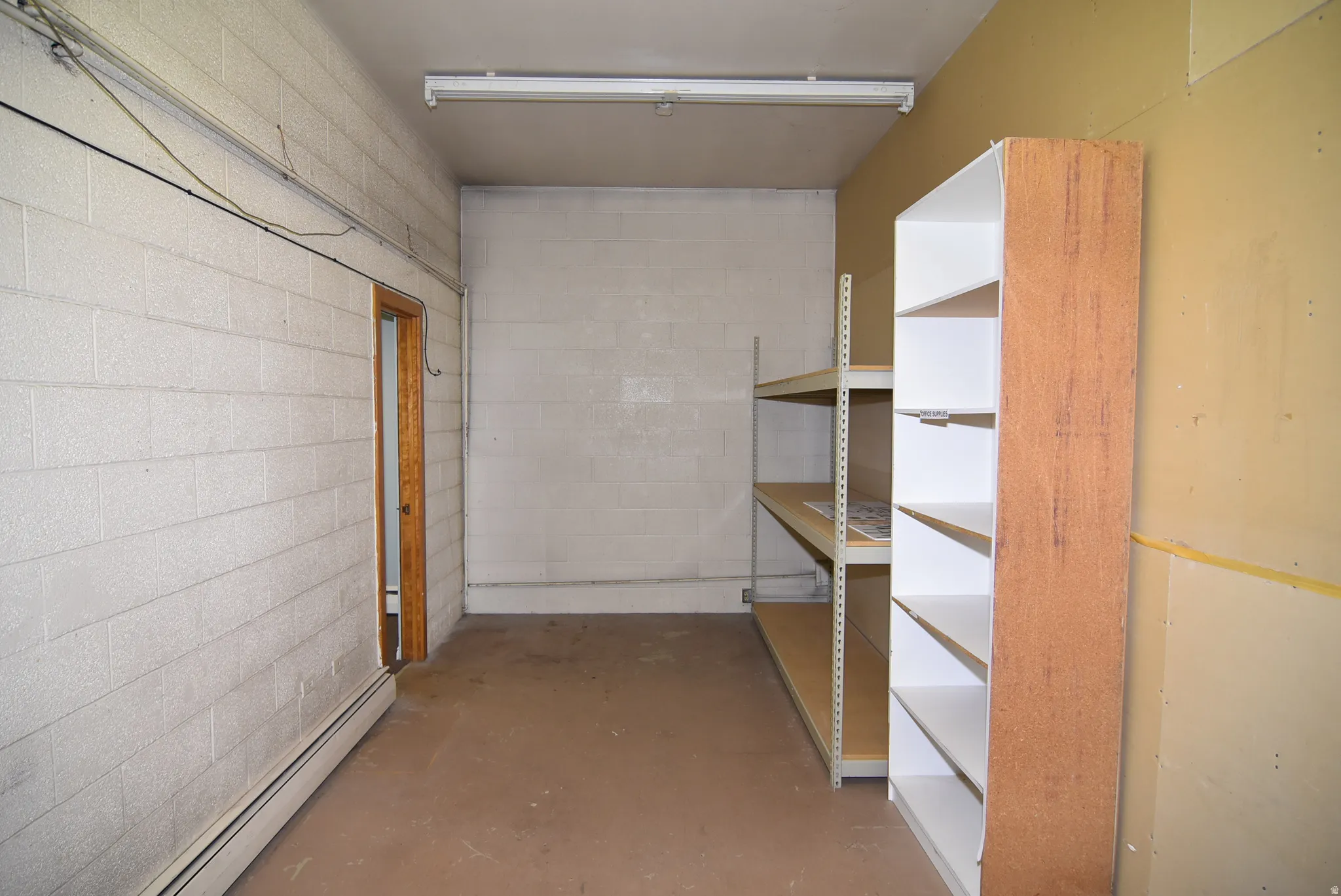Storage featuring a baseboard heating unit