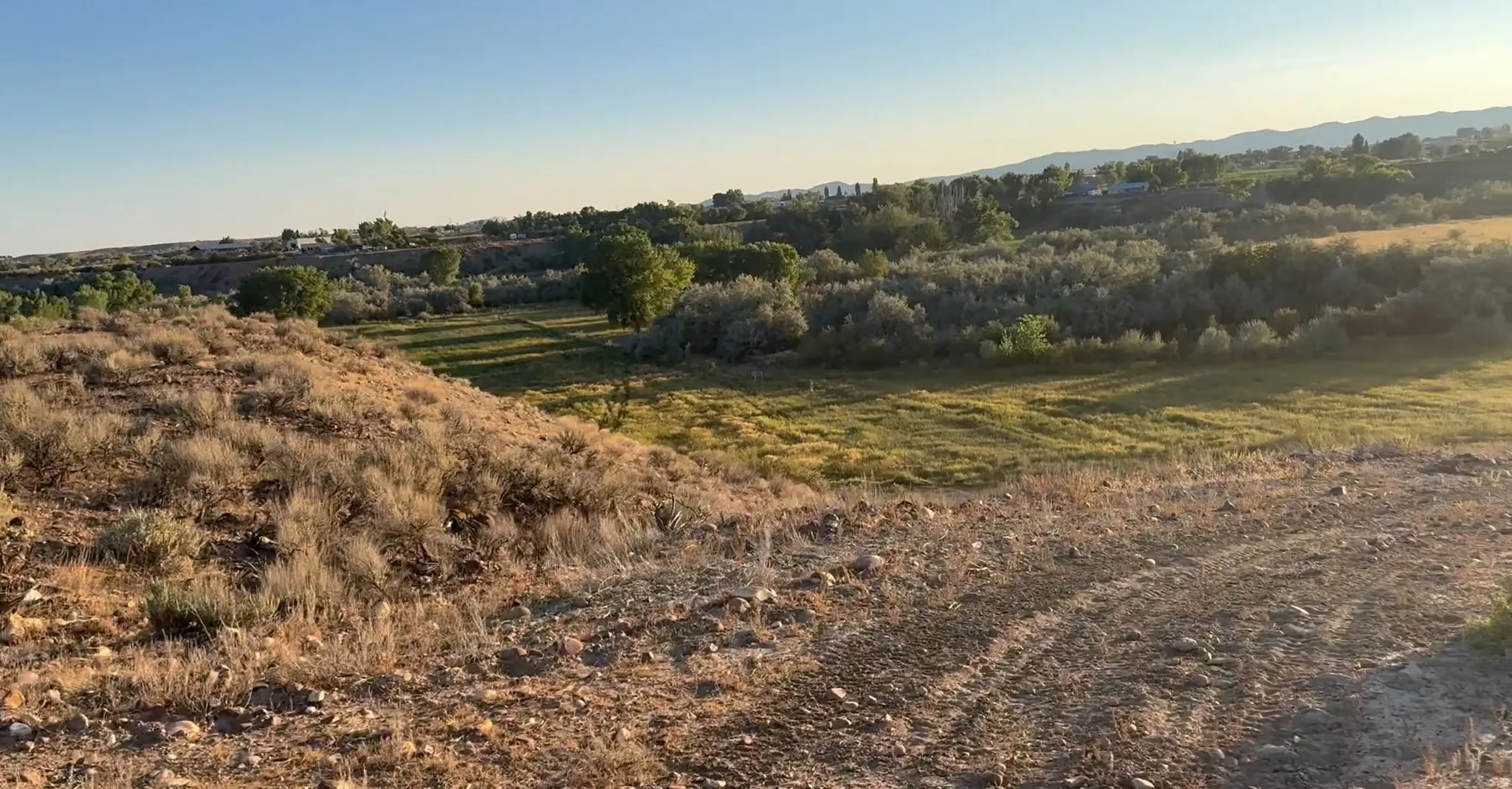 View of undeveloped land featuring rural landscape and a mountainous background