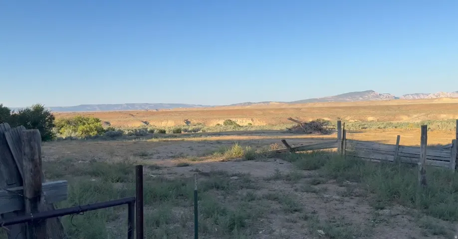 View of yard featuring a view of countryside and a mountain view