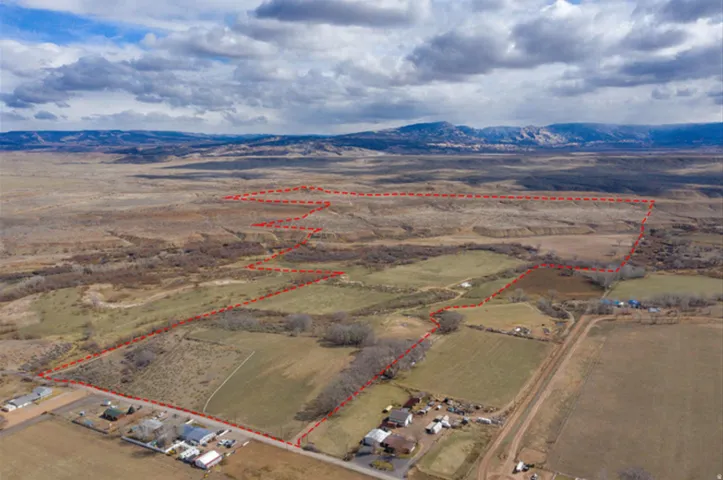 View of rural area with property parcel outlined and mountains