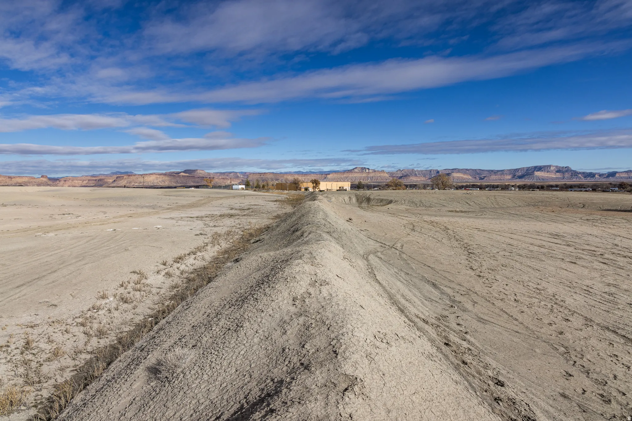 View of dirt / gravel road featuring a mountain view