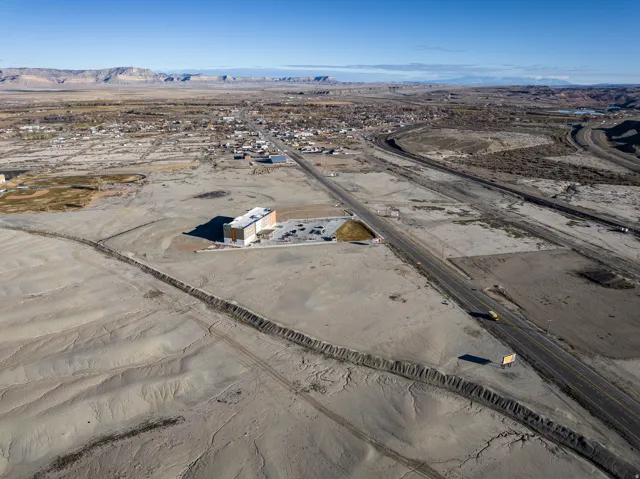 Aerial overview of property's location with mountains and rural landscape