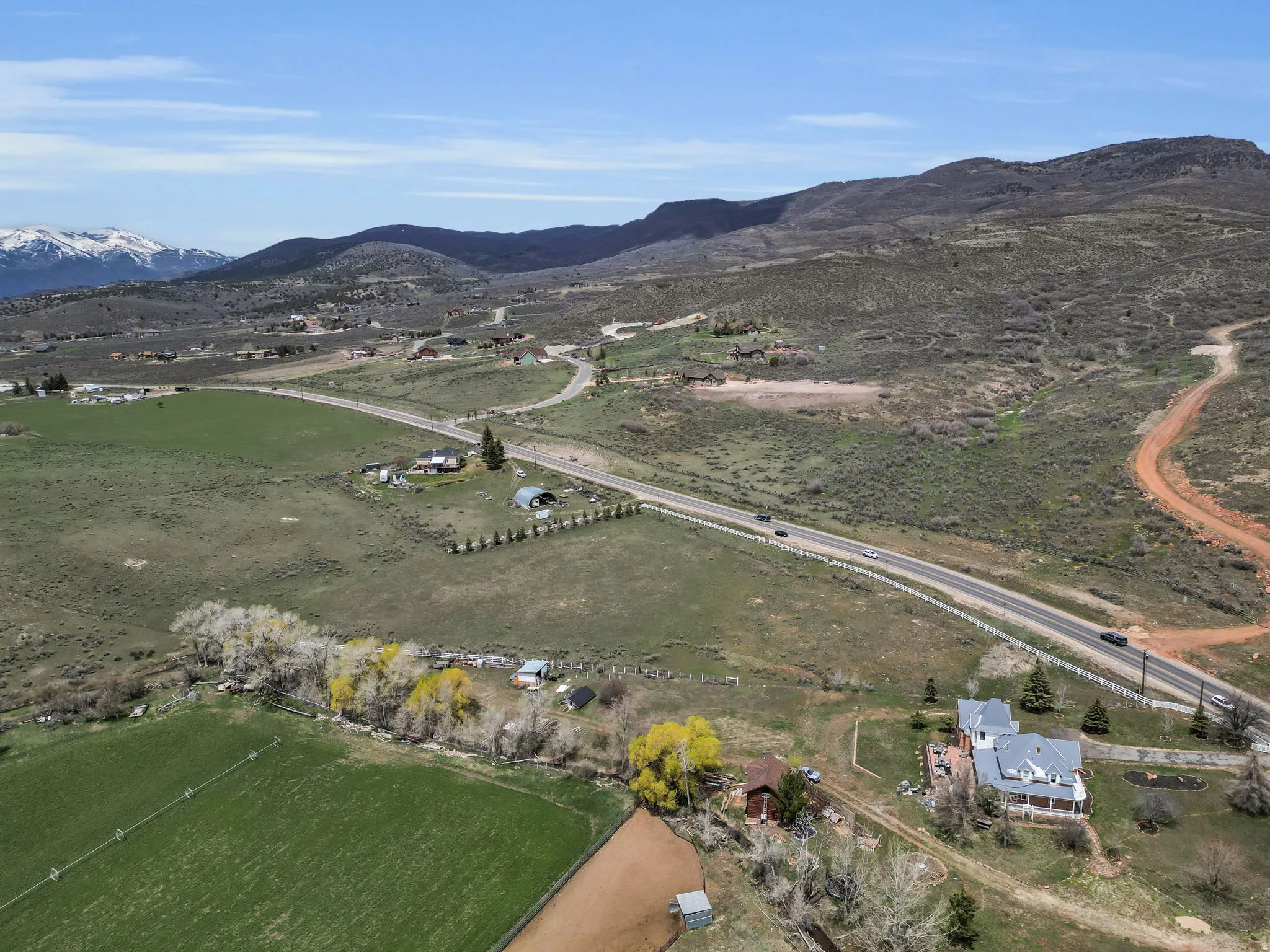 View of property location featuring a mountainous background and rural landscape