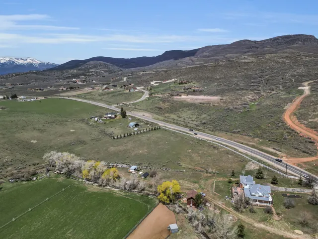 View of property location featuring a mountainous background and rural landscape