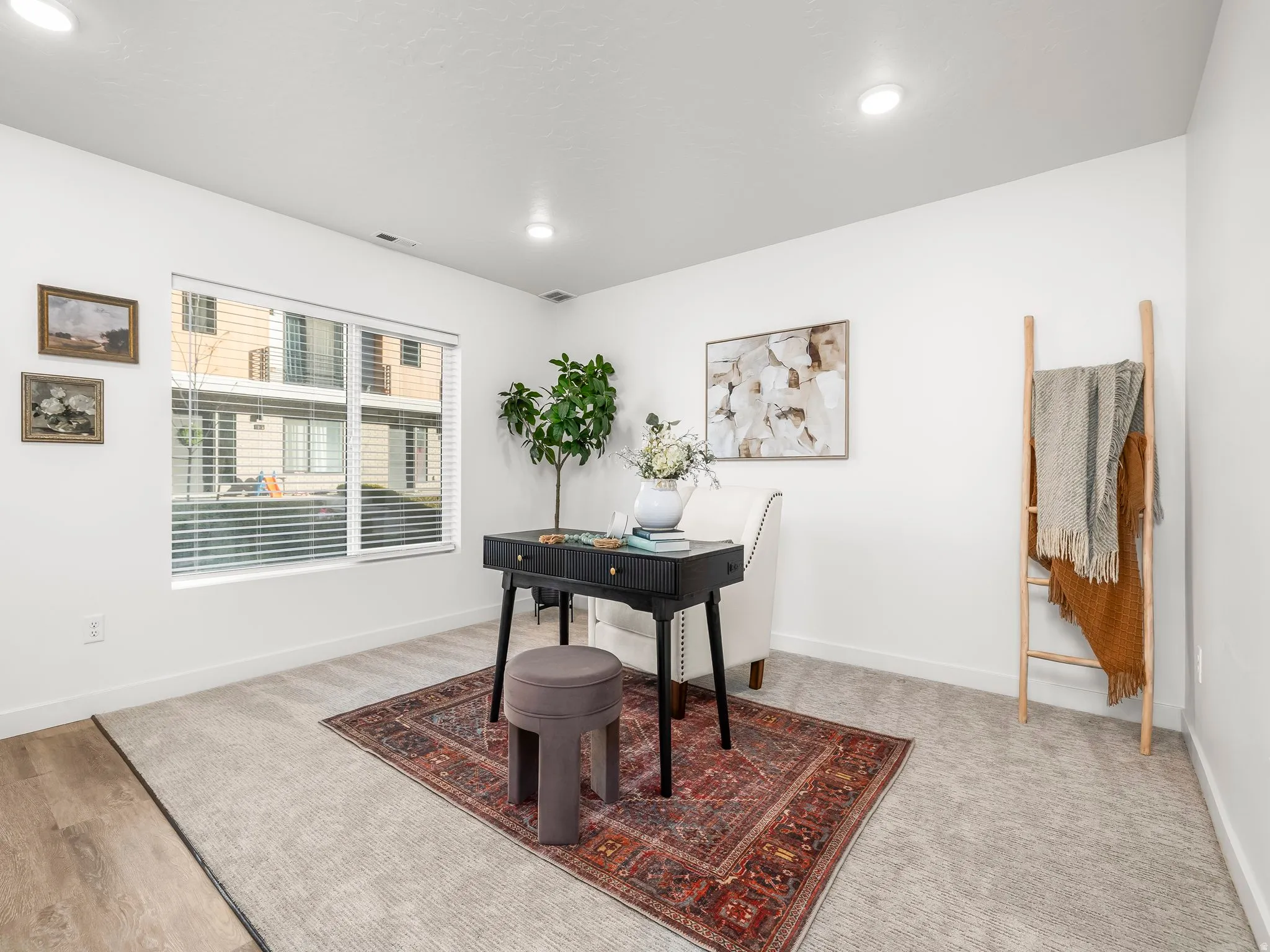 Office area with baseboards and recessed lighting