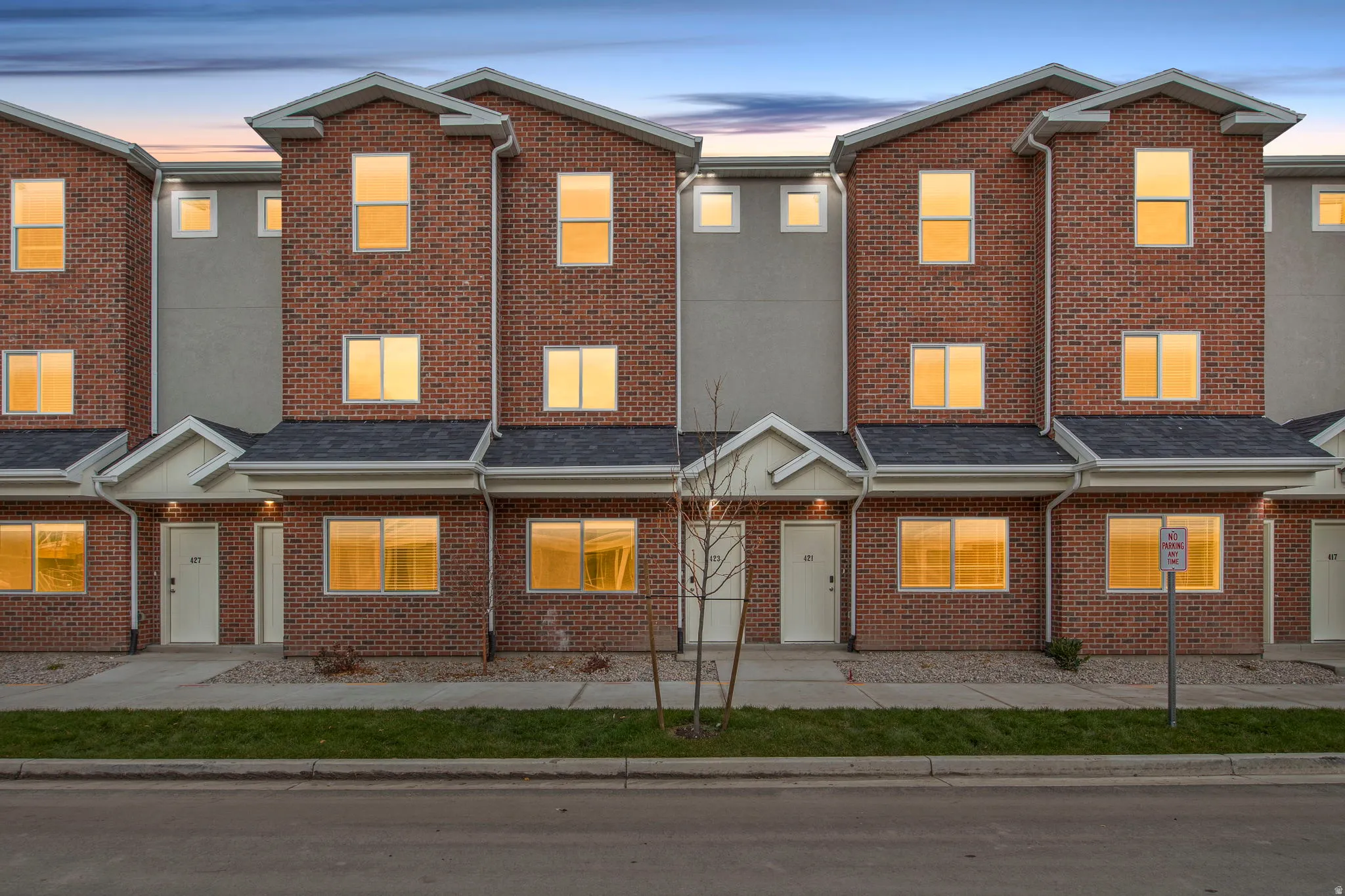 Traditional-style home with brick siding