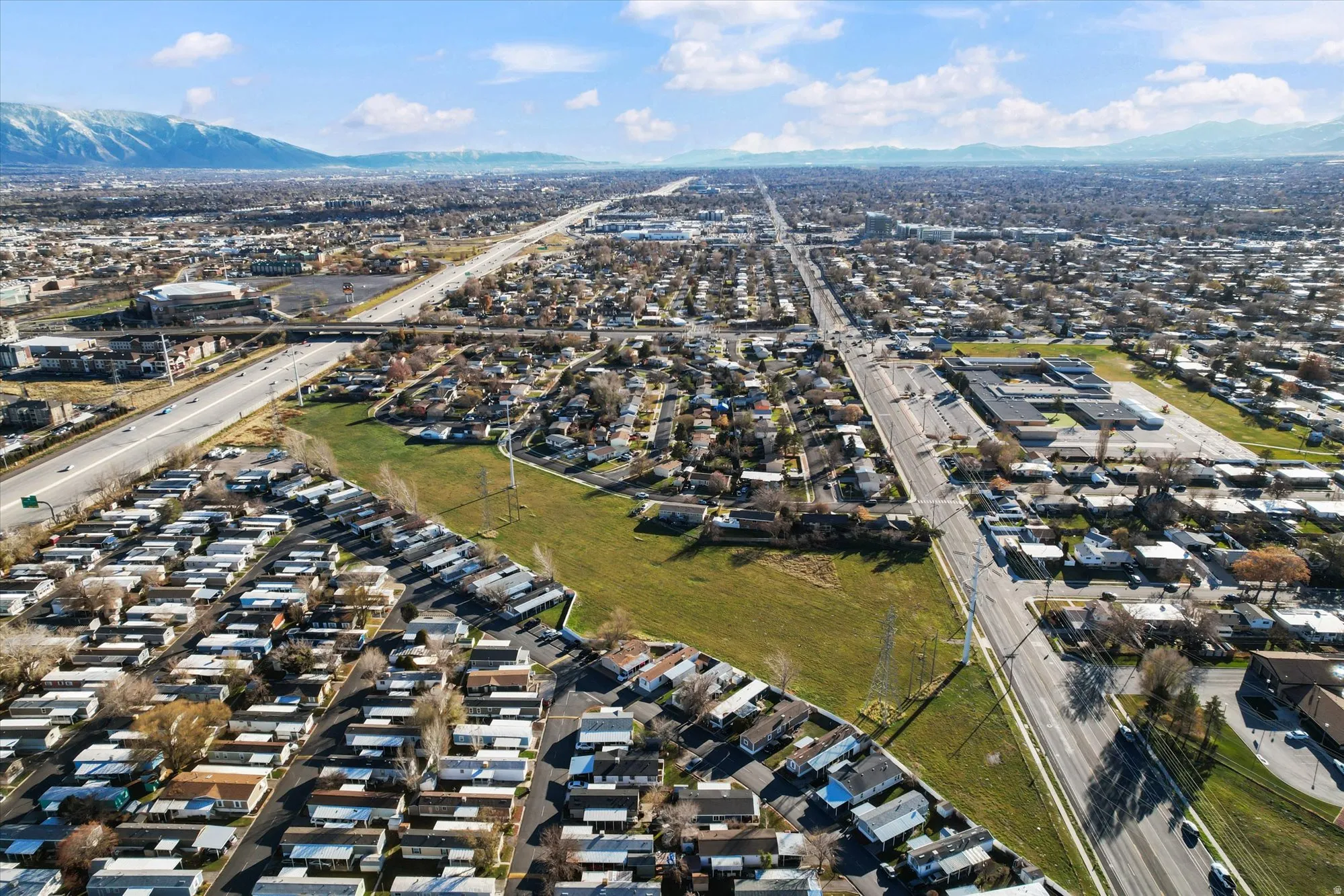 View of property location with nearby suburban area and a mountain backdrop