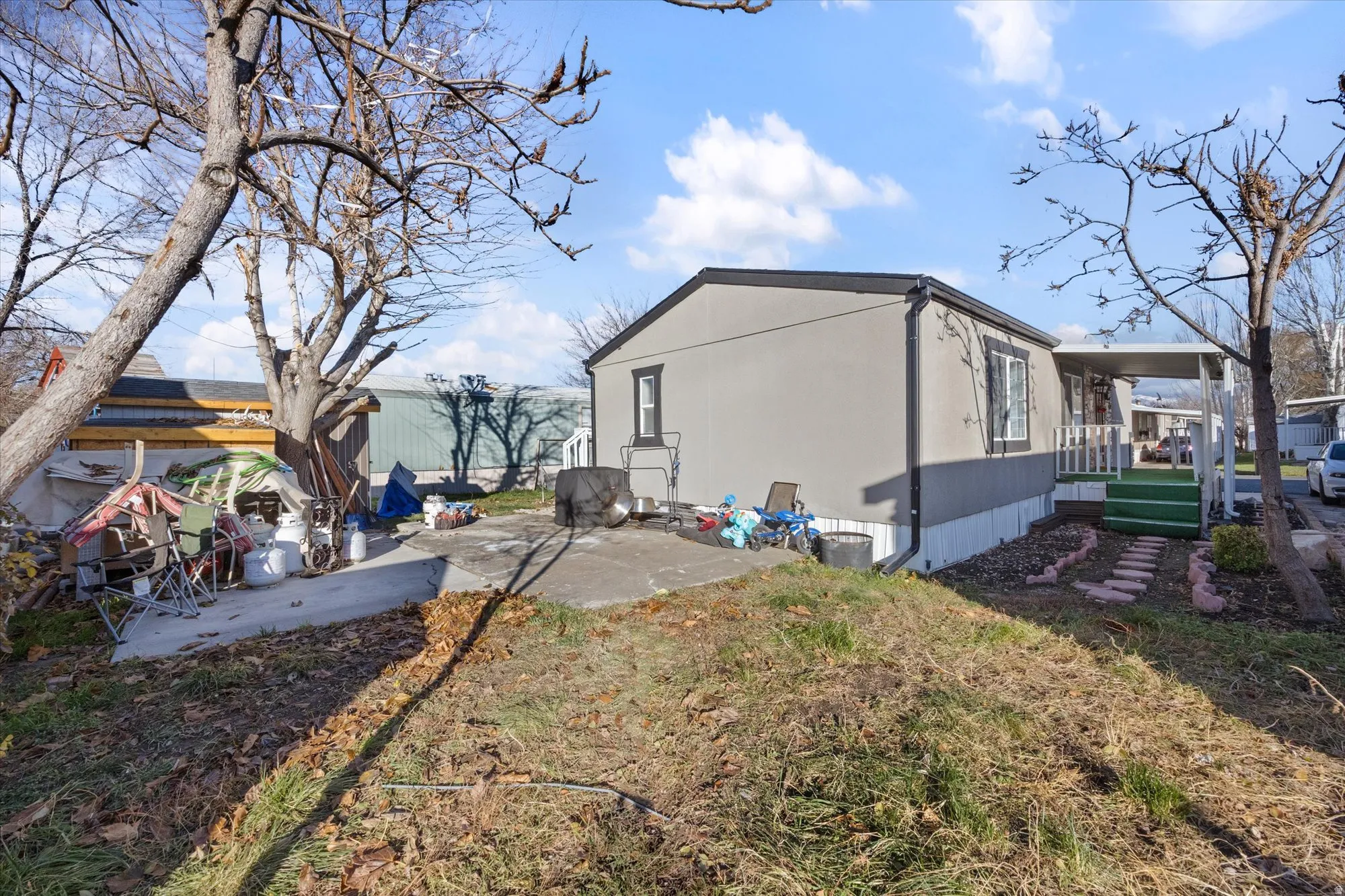 View of side of property featuring a patio