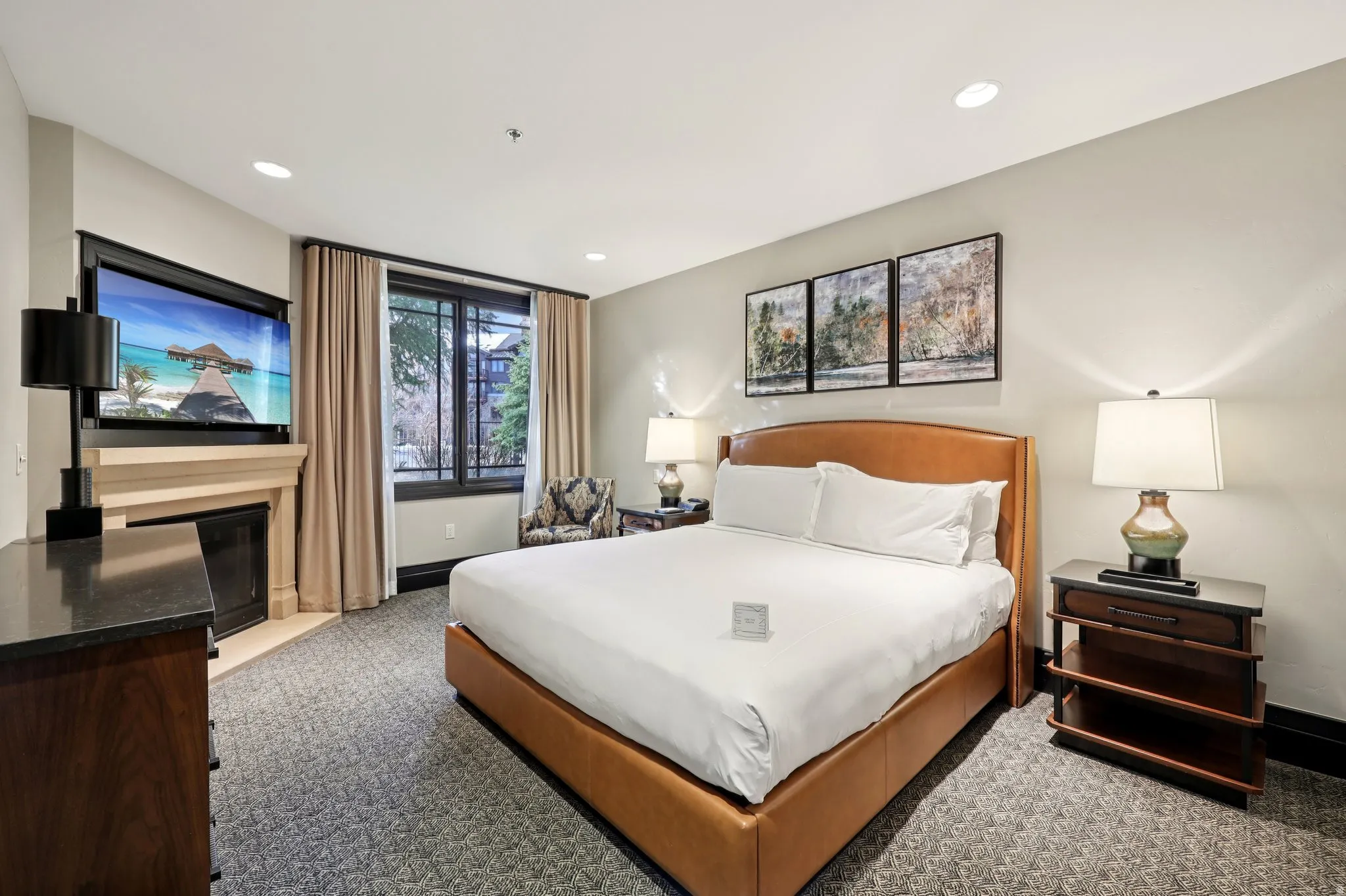 Carpeted bedroom with baseboards and recessed lighting