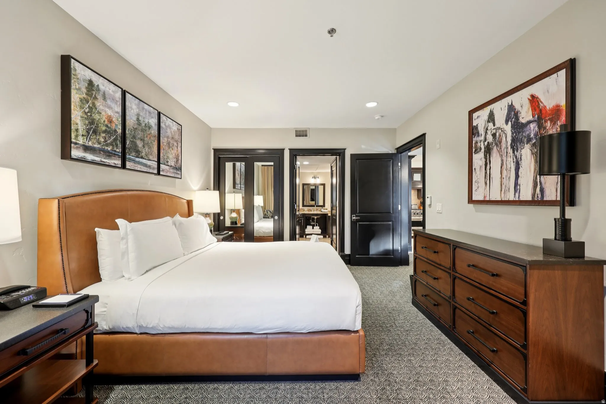 Bedroom featuring light carpet and recessed lighting