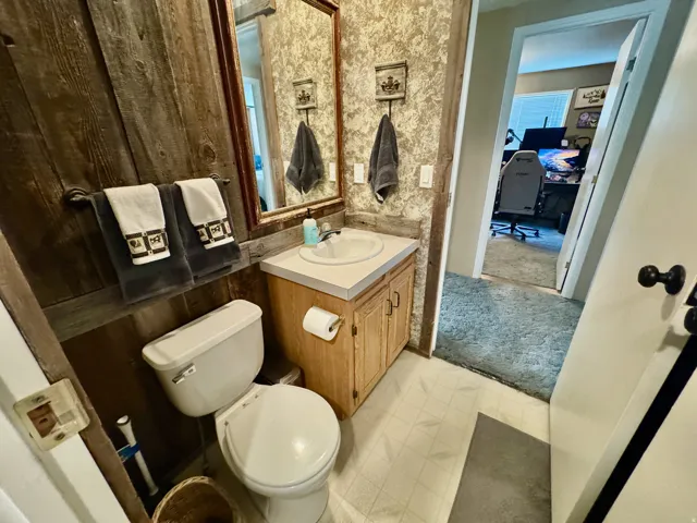 Bathroom featuring vanity and toilet