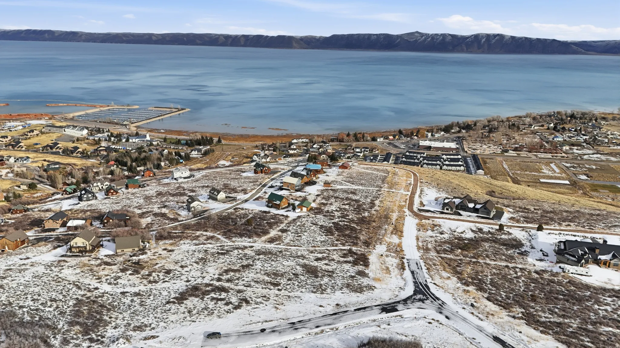 Aerial overview of property's location featuring mountains