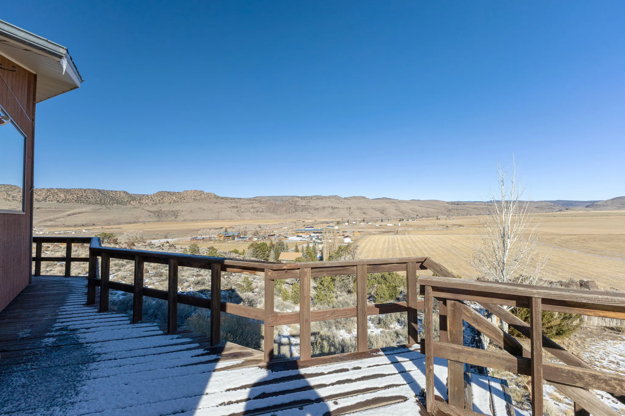 Wooden terrace with a mountain view and a rural view