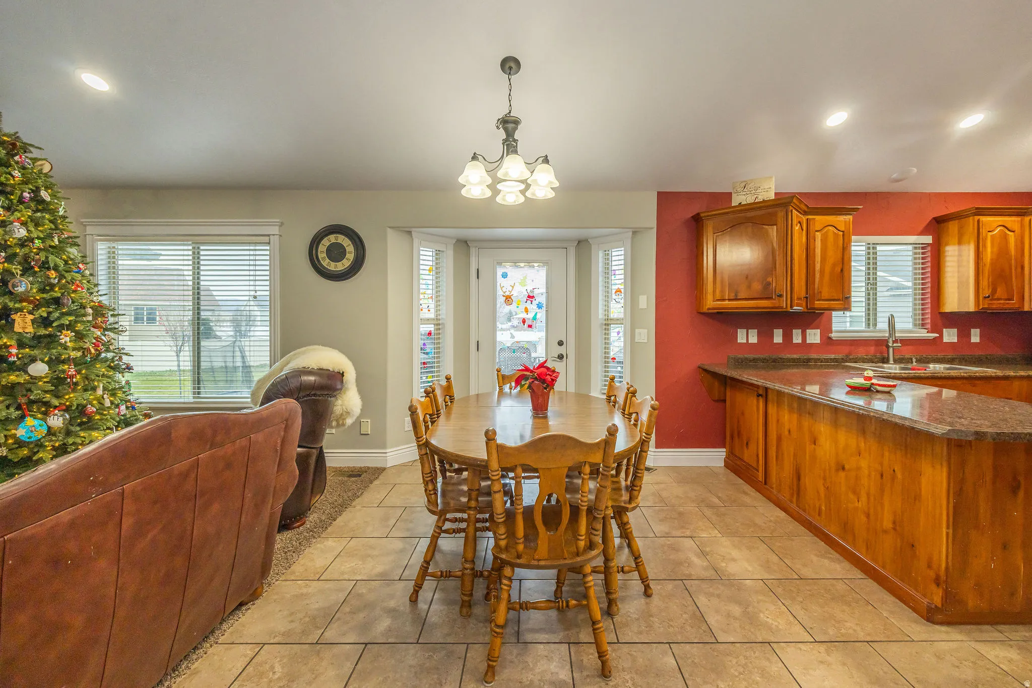 Dining area with recessed lighting and a chandelier