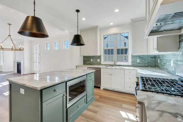 Large island provides extra prep space and has a built-in microwave