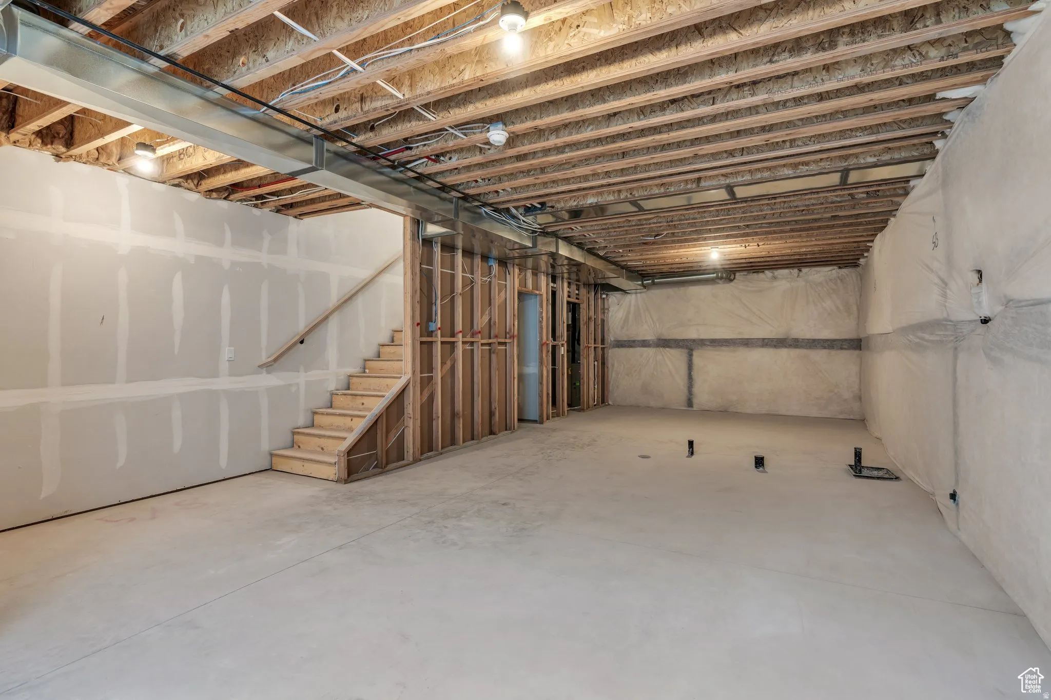 Unfinished basement provides opportunity for another bedroom, bath, and rec room
