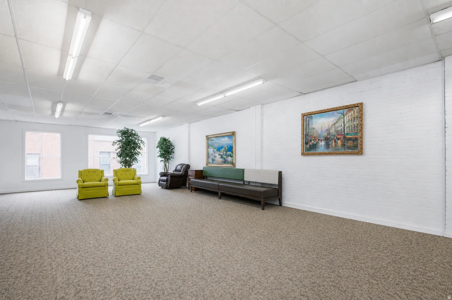 Sitting room featuring a paneled ceiling