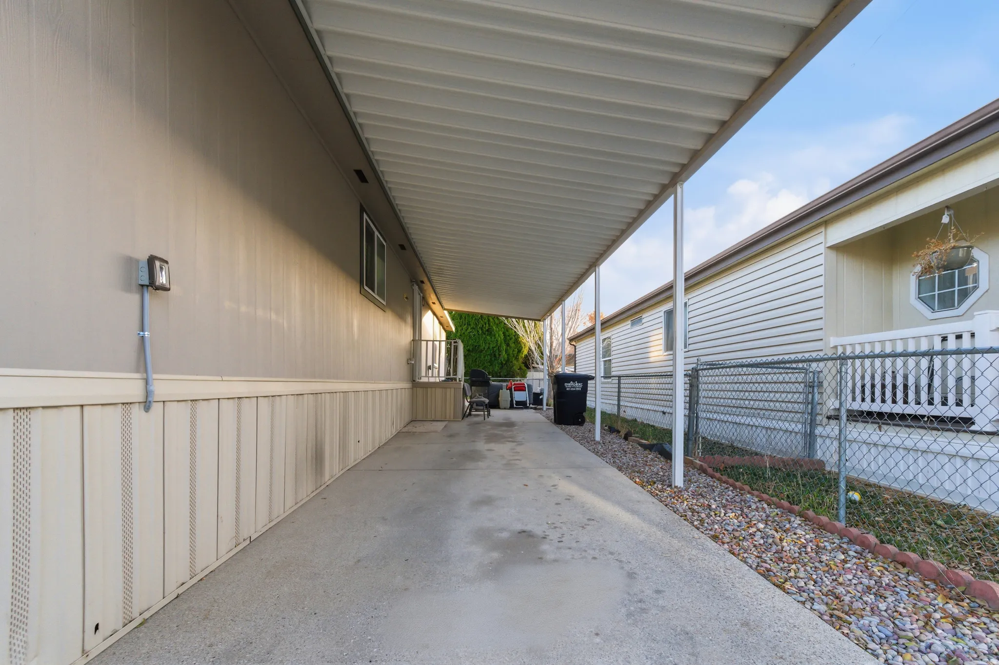 View of patio / terrace featuring a carport