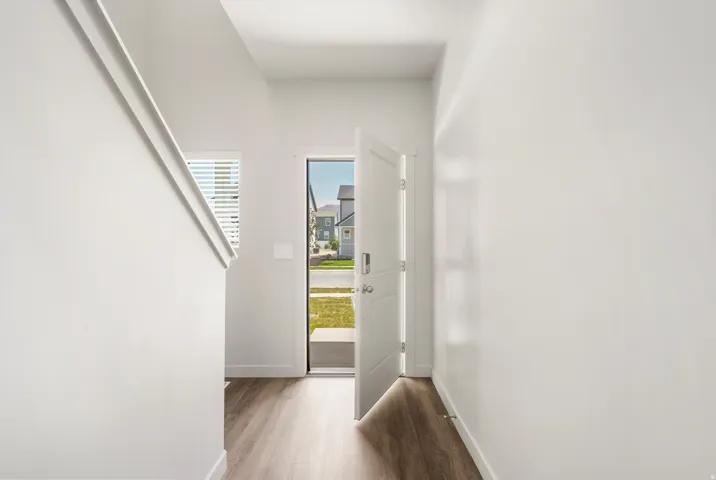 **DISLCAIMER** Exterior & Interior packages may vary.Foyer entrance with wood finished floors and baseboards