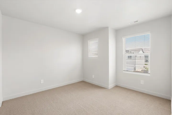 **DISLCAIMER** Exterior & Interior packages may vary.Unfurnished room with light colored carpet and recessed lighting