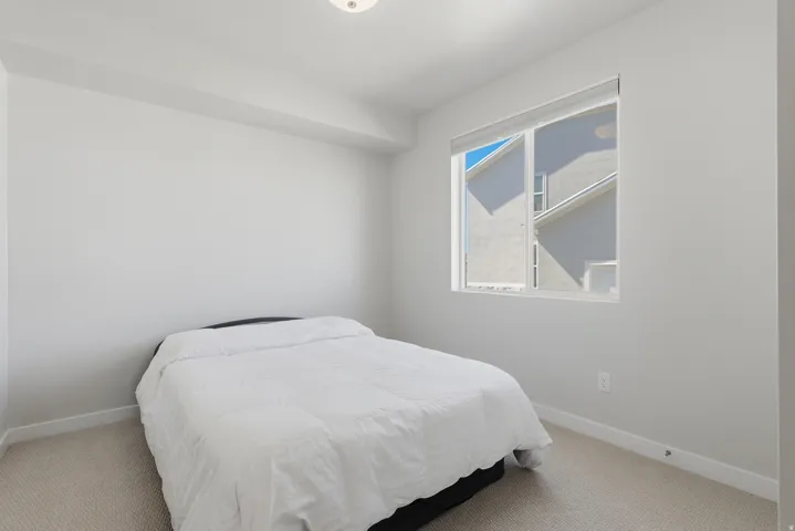 4th Bedroom (Guest)  featuring carpet and baseboards Next to Full Bathroom