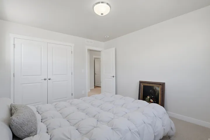 3rd Bedroom view 2 with a closet and baseboards