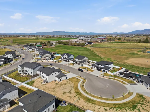 Aerial view of residential area with a mountainous background