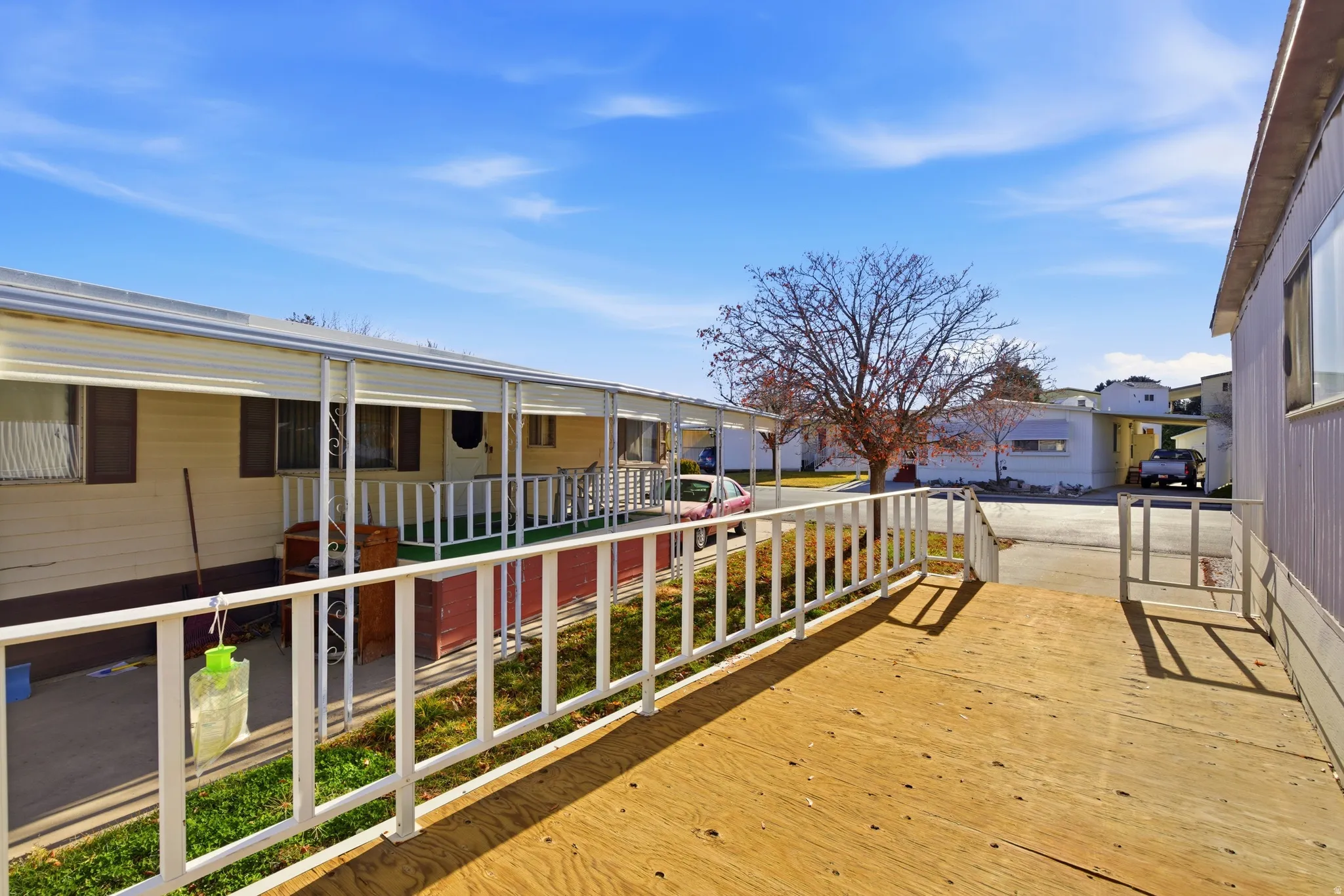 Wooden deck featuring a residential view