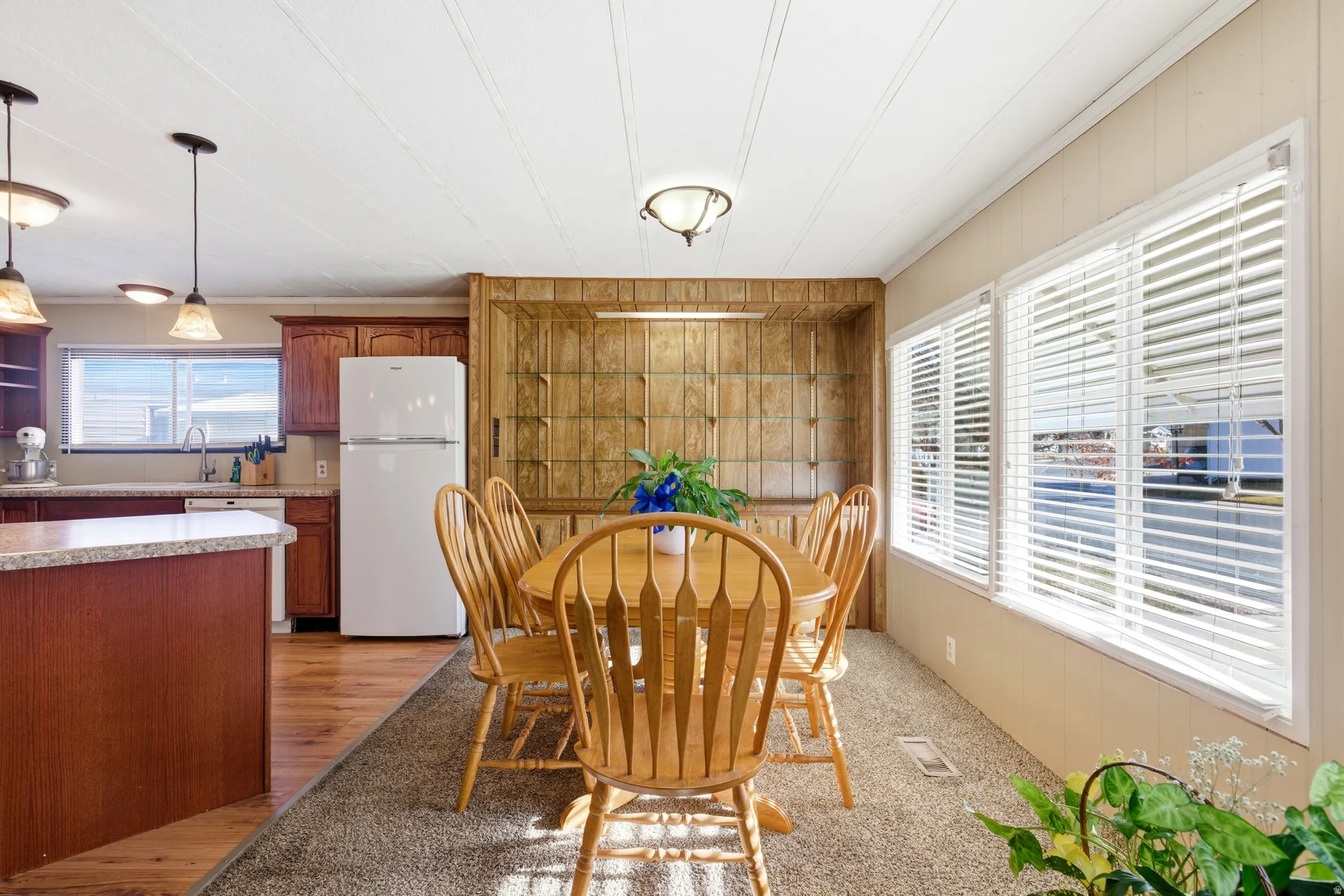 Dining space with wood walls