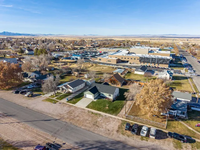 Aerial view of residential area with a mountain backdrop