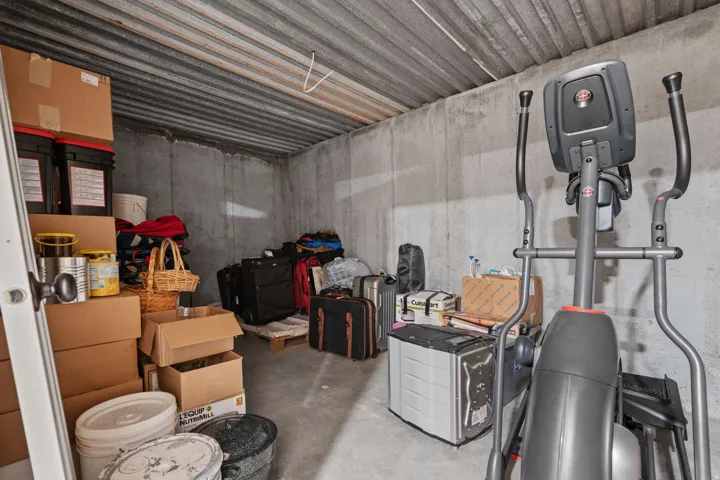 Storage room in basement under the deck